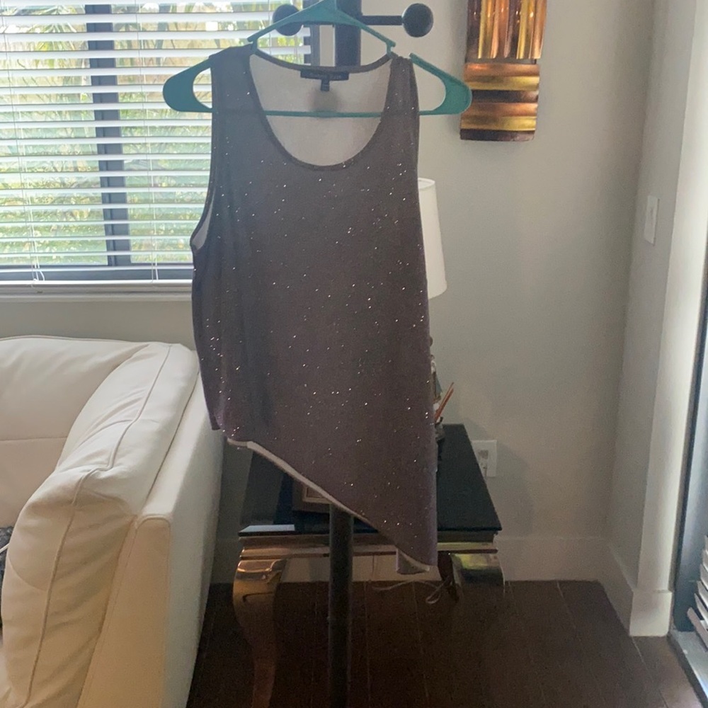 A purple glitter shirt, size medium in women's